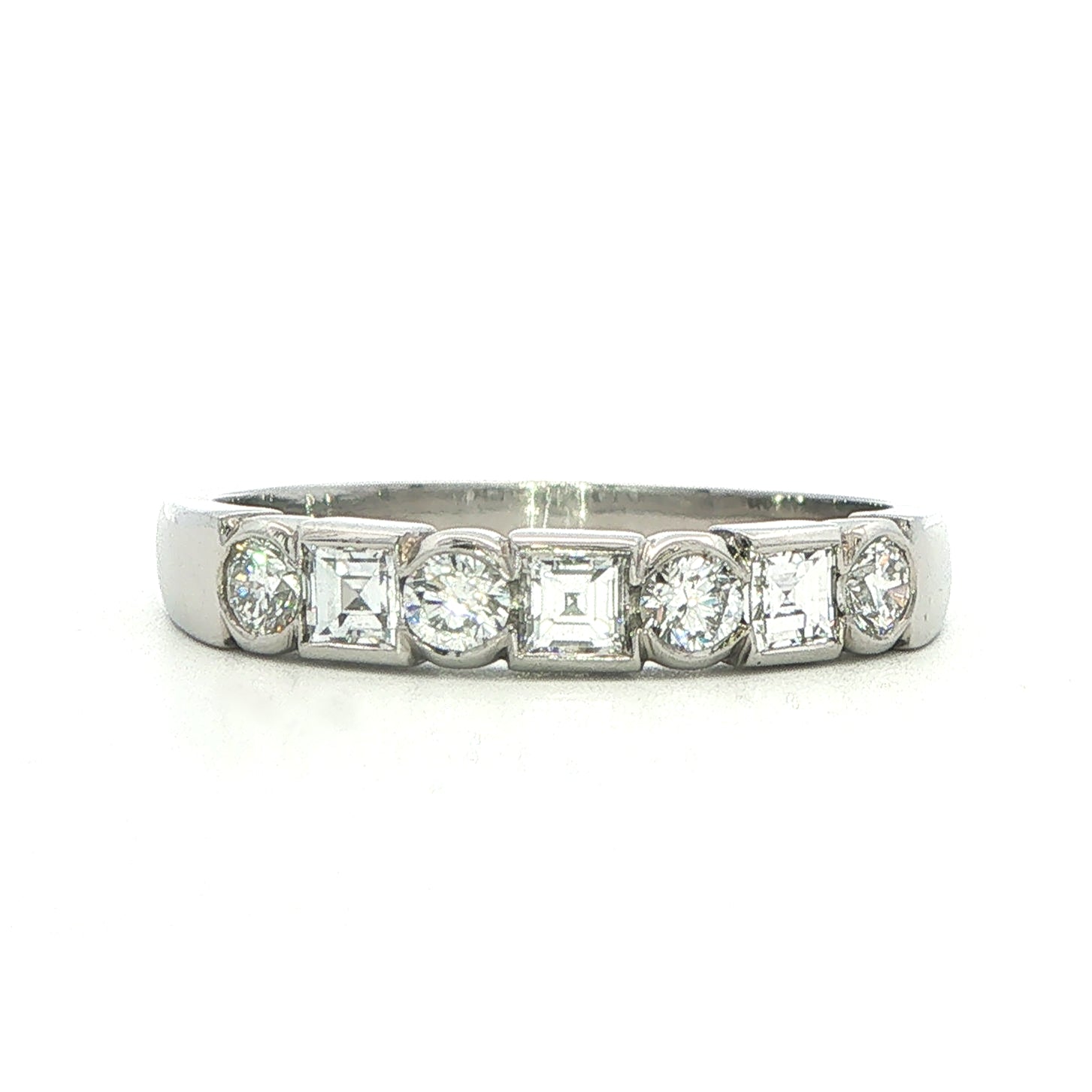 A Platinum and Diamond Eternity Style Ring - 0.58 Carats