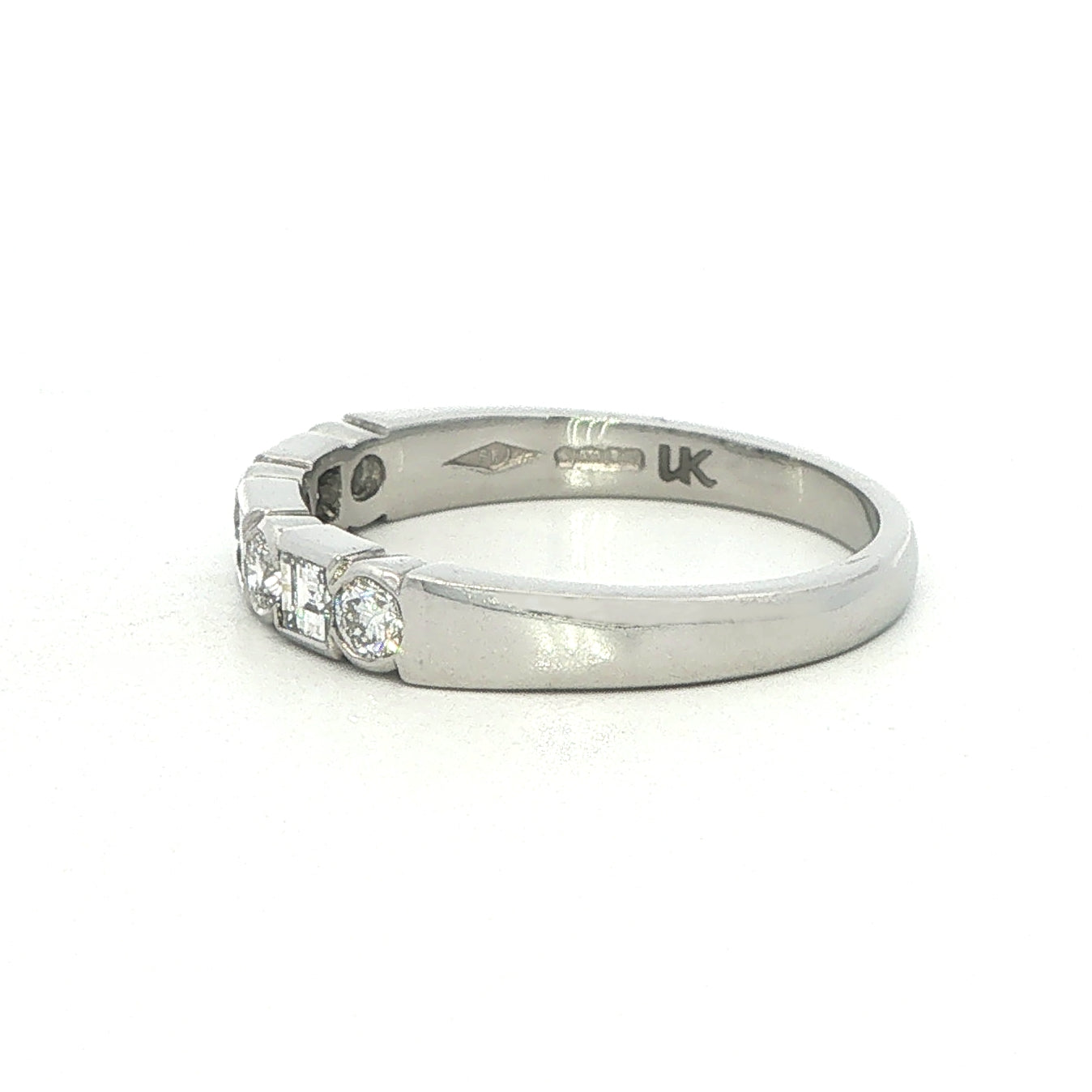 A Platinum and Diamond Eternity Style Ring - 0.58 Carats