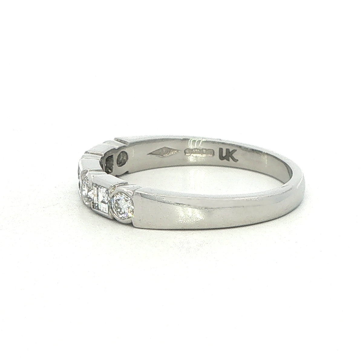 A Platinum and Diamond Eternity Style Ring - 0.58 Carats