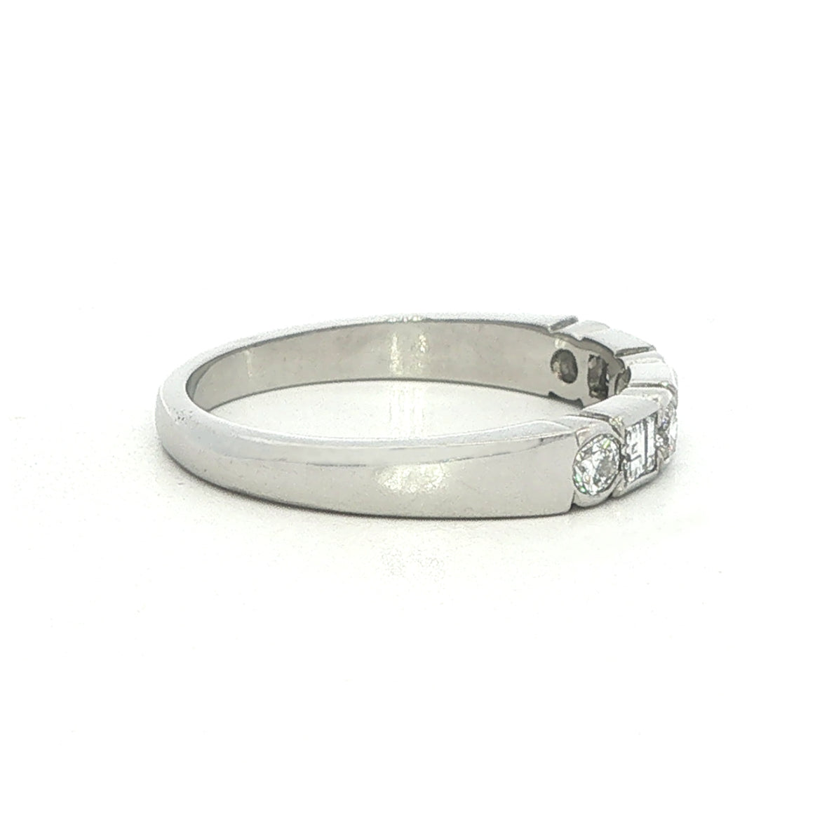 A Platinum and Diamond Eternity Style Ring - 0.58 Carats