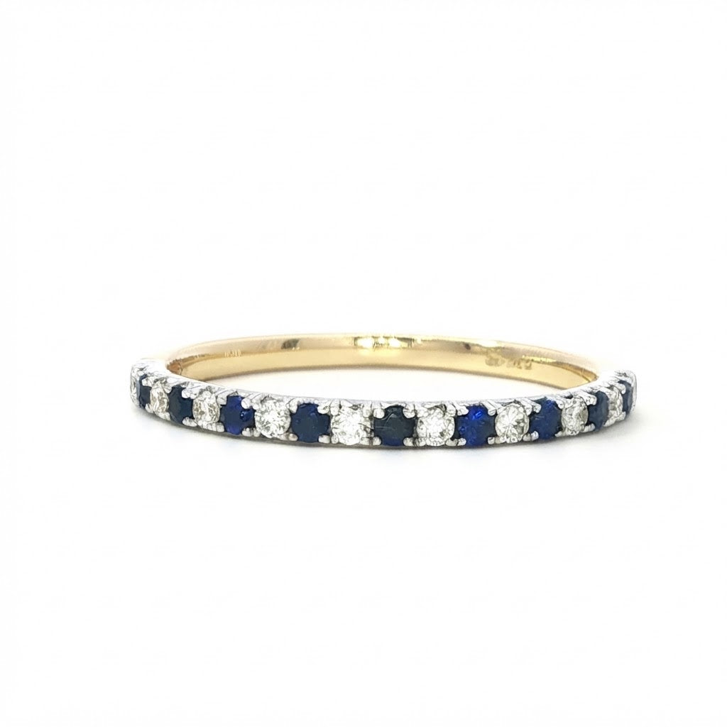 A 18 Carat Yellow and White Gold Sapphire and Diamond Half Eternity Style Ring