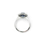 A modern 18 carat white gold Sapphire 2.64 Cts and diamond 0.42 Cts cluster ring.
