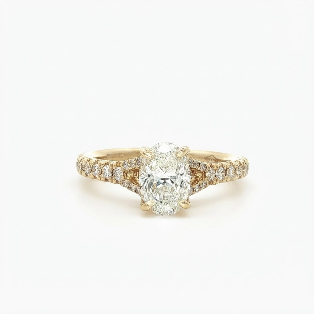 An 18 Carat Yellow Gold Oval Diamond Engagement Ring 1.01 carats H Si2