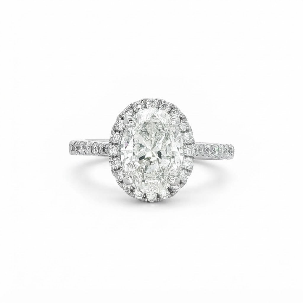 A  Platinum Halo Oval Diamond Engagement Ring 2.00 carats H Si2