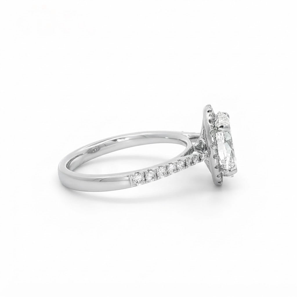 A  Platinum Halo Oval Diamond Engagement Ring 2.00 carats H Si2