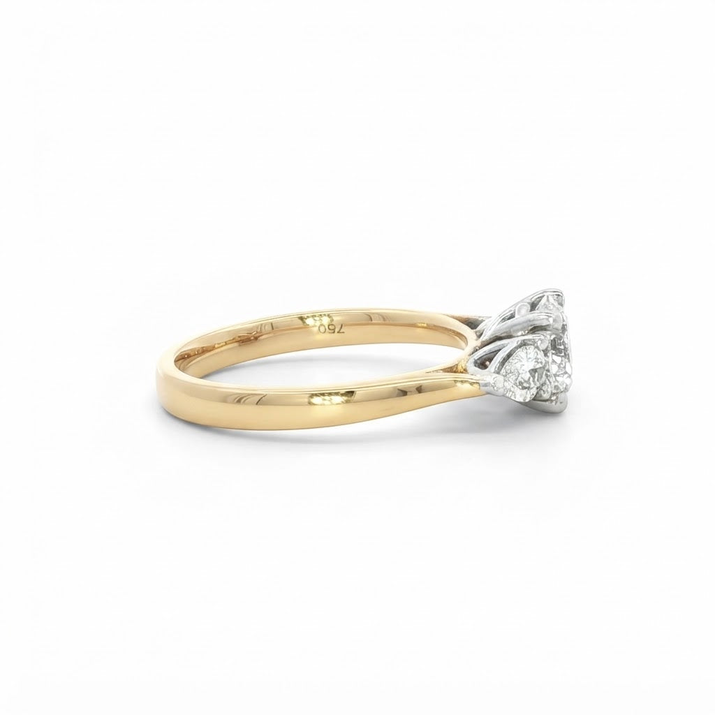 An 18 Carat Yellow Gold Round Brilliant 0.90 D Si1 and Pear Shape Diamond Engagement Ring 1.20 TCW