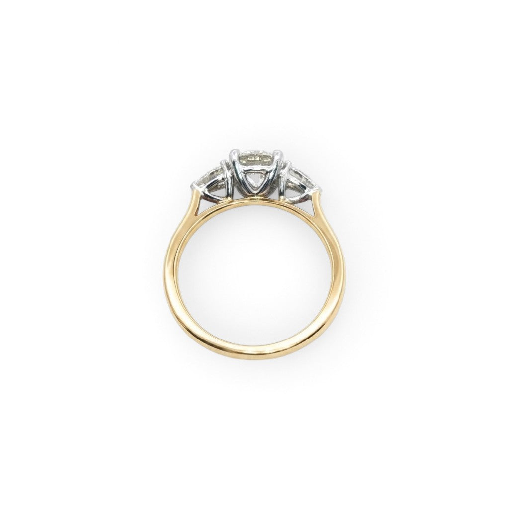 An 18 Carat Yellow Gold Round Brilliant 0.90 D Si1 and Pear Shape Diamond Engagement Ring 1.20 TCW