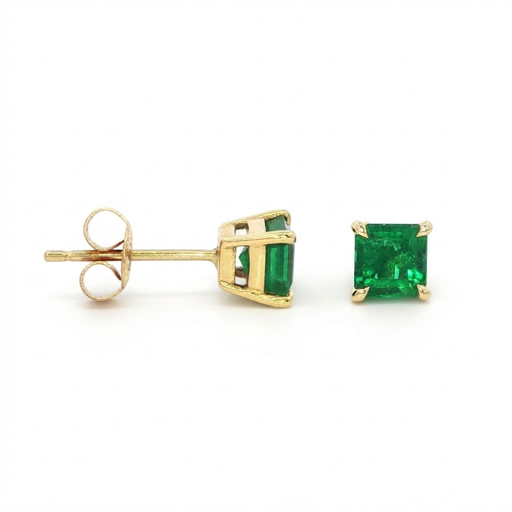 A Pair of 18 Carat Yellow Gold Square Emerald Studs