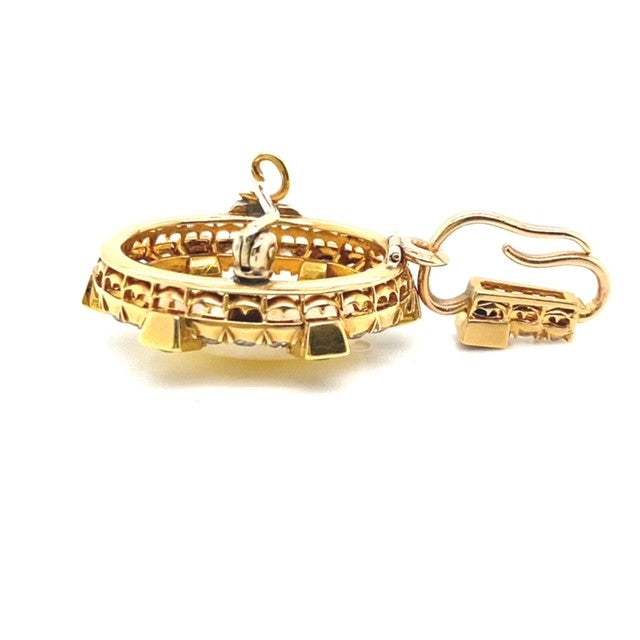 A yellow gold Opal pendant featuring Diamonds and Sapphire