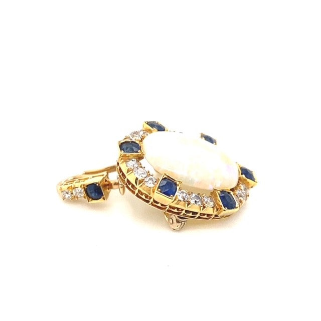 A yellow gold Opal pendant featuring Diamonds and Sapphire