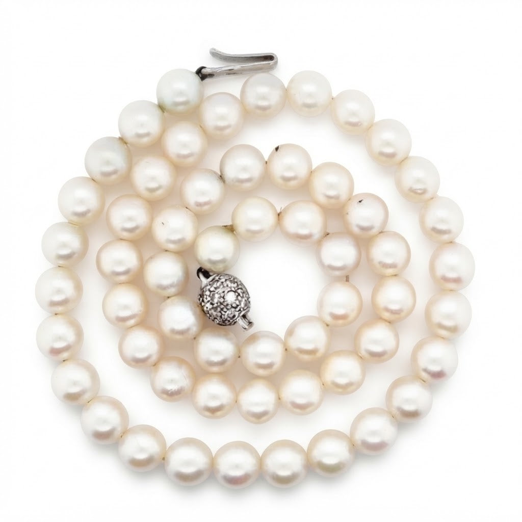 A Freshwater Pearl necklace with Diamond Set Ball Clasp