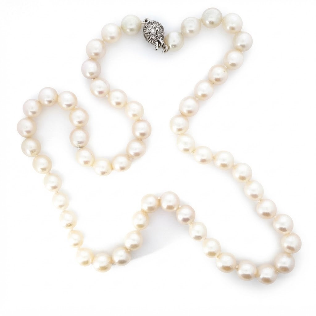 A Freshwater Pearl necklace with Diamond Set Ball Clasp