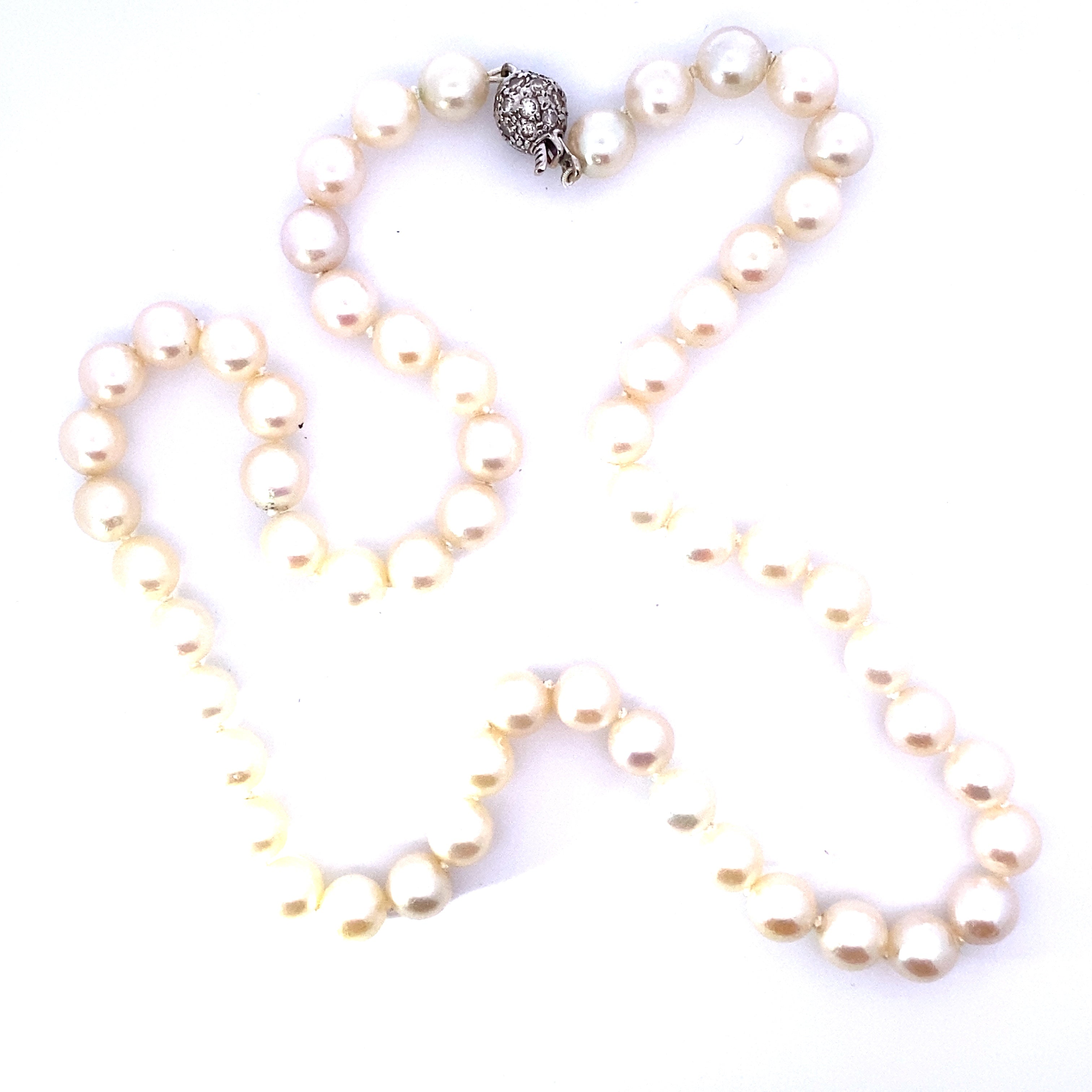 A Freshwater Pearl necklace with Diamond Set Ball Clasp