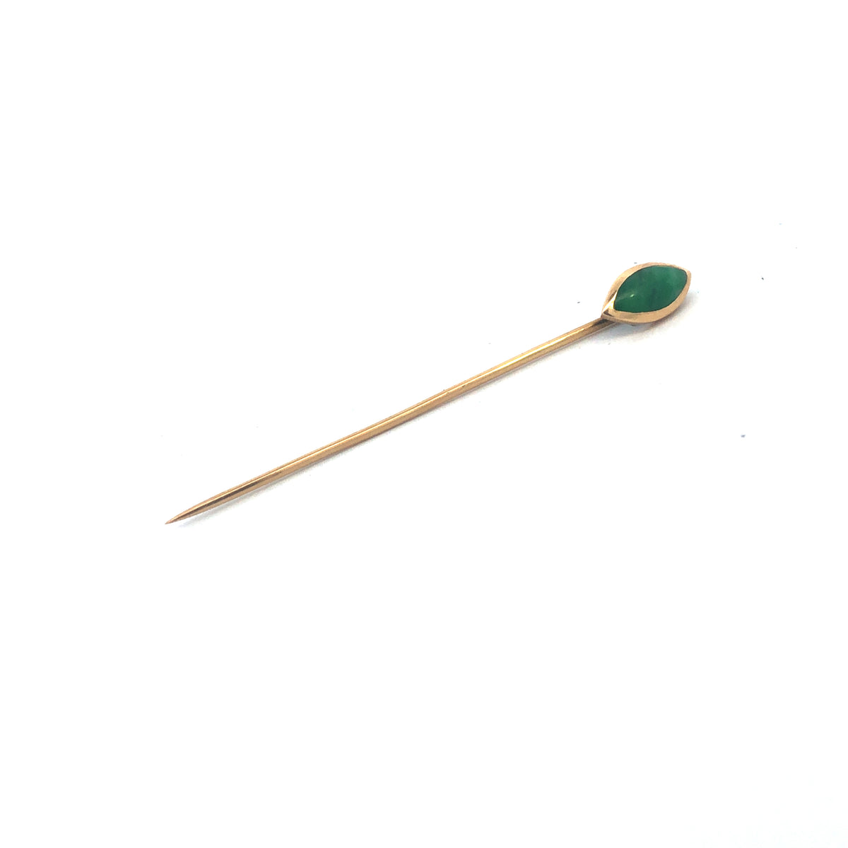 A yellow gold malachite stick pin