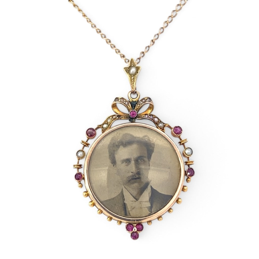 A Rare Ruby and Pearl Glass Locket