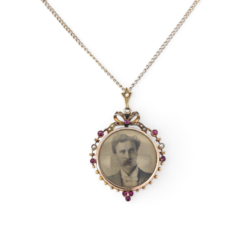 A Rare Ruby and Pearl Glass Locket