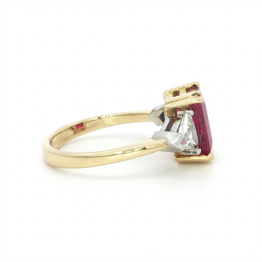 An 18 Carat Yellow and White Gold Ruby and Diamond Ring