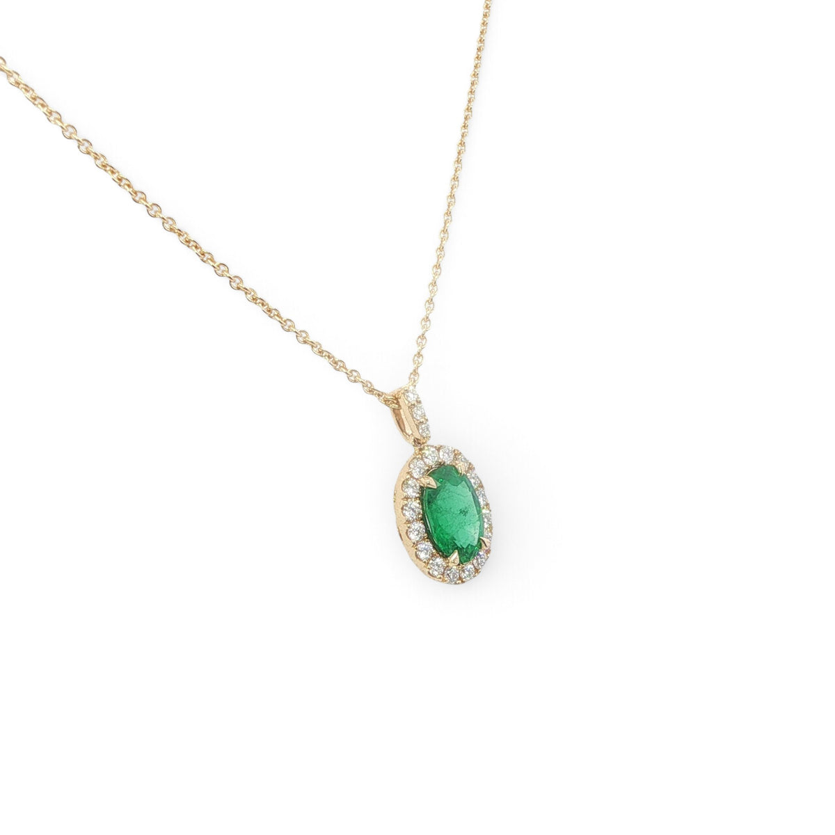 An 18 Carat Yellow Gold Emerald & Diamond Halo Pendant