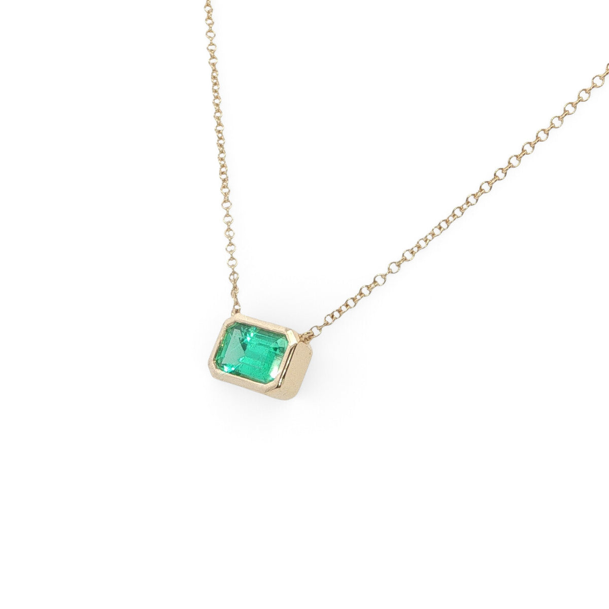 18 Carat Yellow Gold Emerald Cut Emerald Pendant
