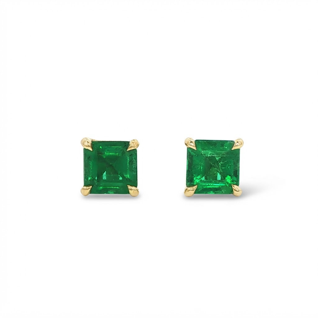 A Pair of 18 Carat Yellow Gold Square Emerald Studs
