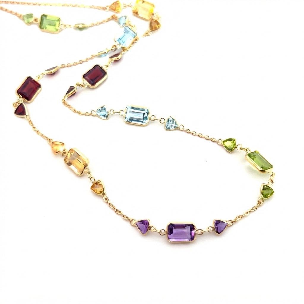 18 Carat Yellow Gold Chain Gem-set Drop Necklace With Emerald Cuts and Trillion Shapes 