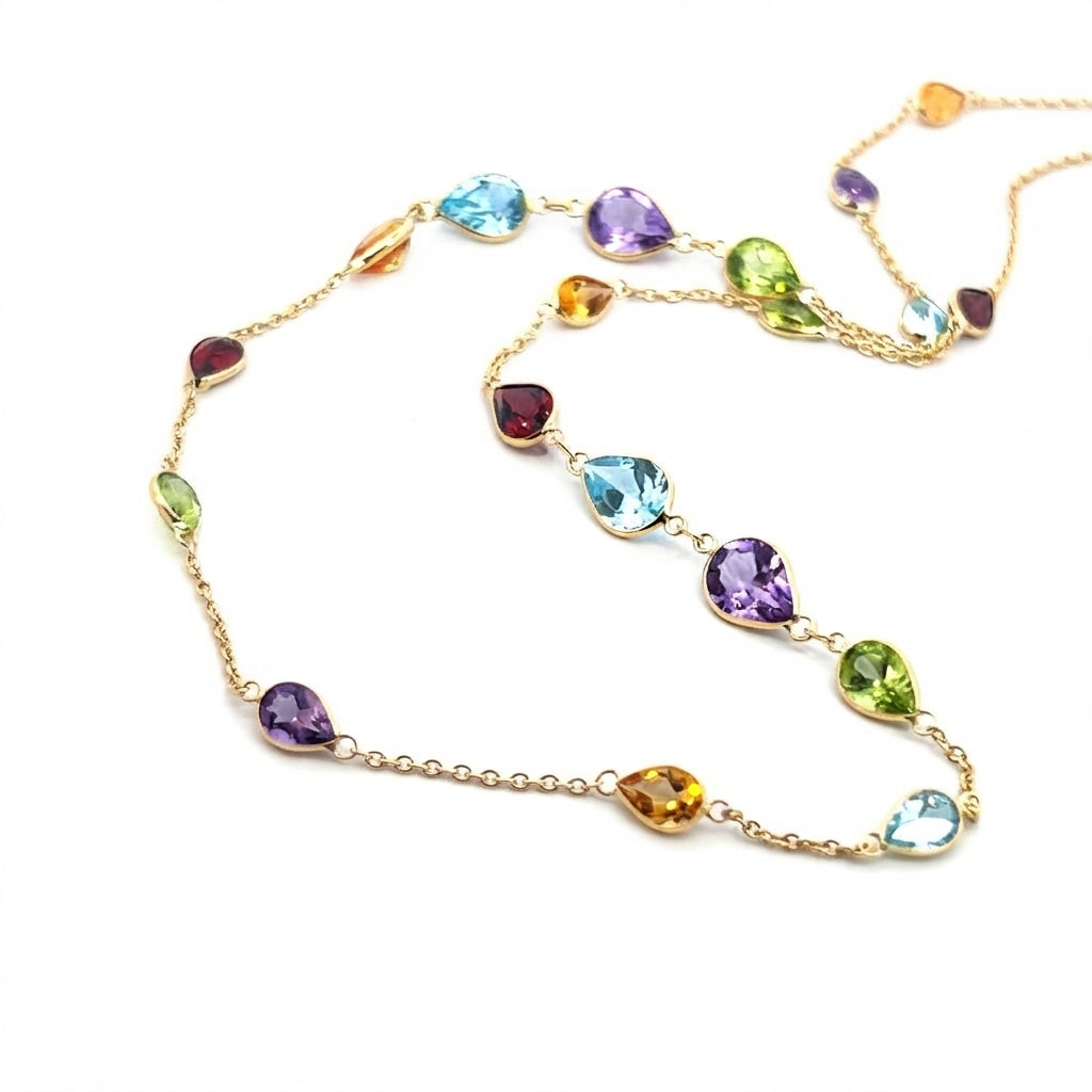 18 Carat Yellow Gold Chain Gem-set Drop Necklace With Various sized Pear Shapes