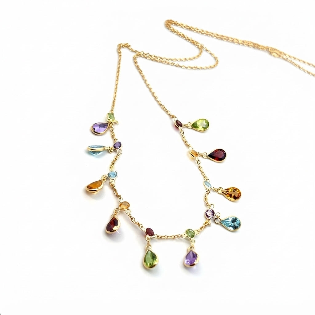 A Modern 18 Carat Yellow Gold and Gem set Necklace