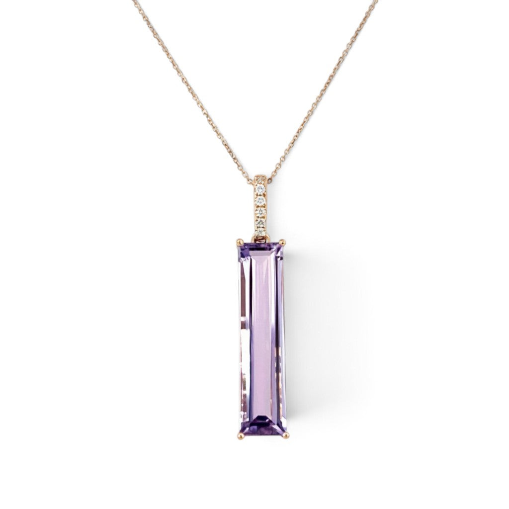  A modern 18 carat rose gold amethyst and diamond pendant. Featuring a 6x25mm step cut amethyst in a four claw double gallery setting to an articulated rose gold bail set with six (6) claw set natural modern round brilliant diamonds of G/H colour VS clarity. To a 46cm inch rose gold trace chain with an extender loop at 41cms
