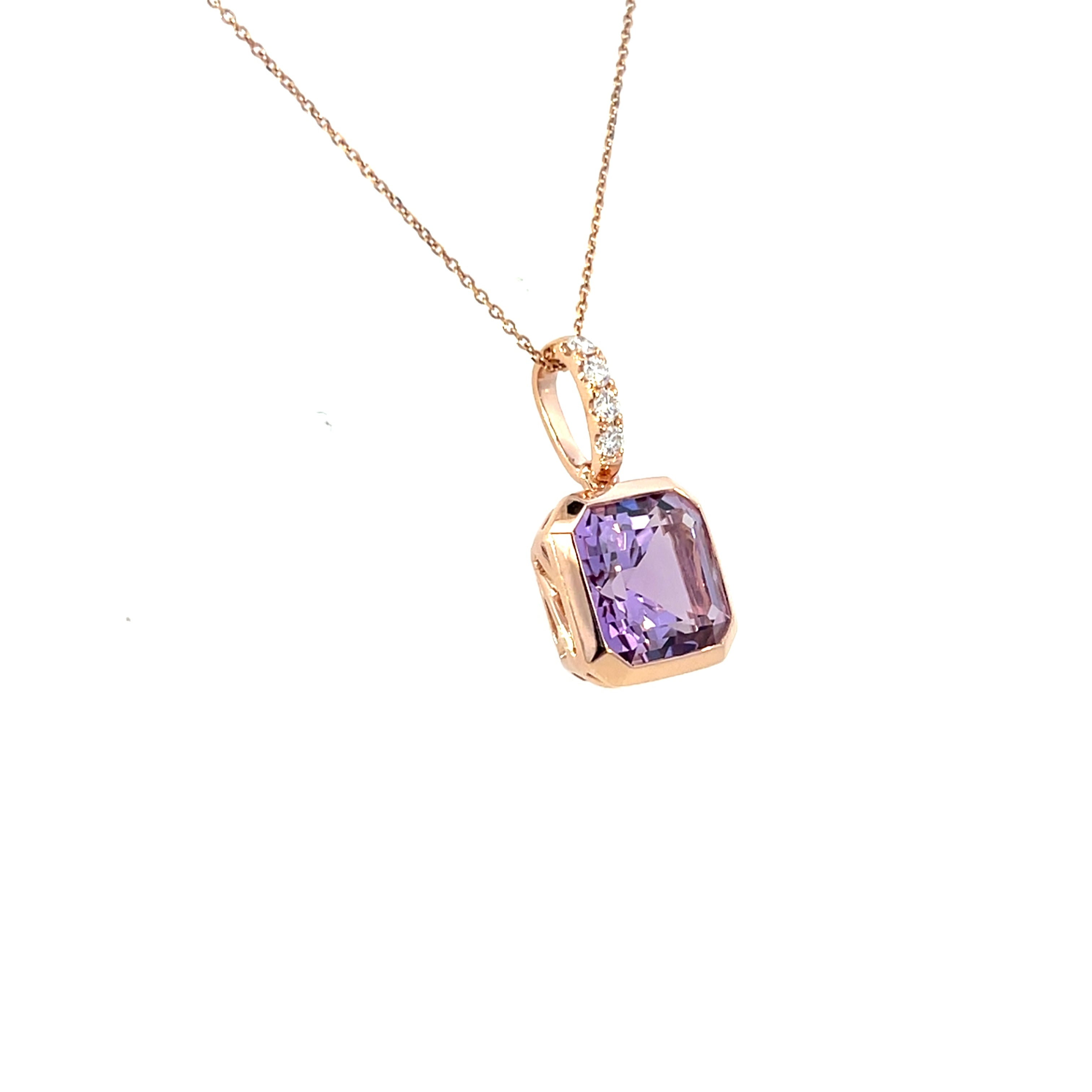 A modern 18 Carat rose gold amethyst and diamond pendant. Featuring a 9mm square step cut natural amethyst in a rose gold rub over settings to an articulated diamond set bail with four (4) natural white modern round brilliant diamonds of G/H colour VS clarity in claw settings. To a 46cm inch rose gold trace chain with an extender loop at 41cms