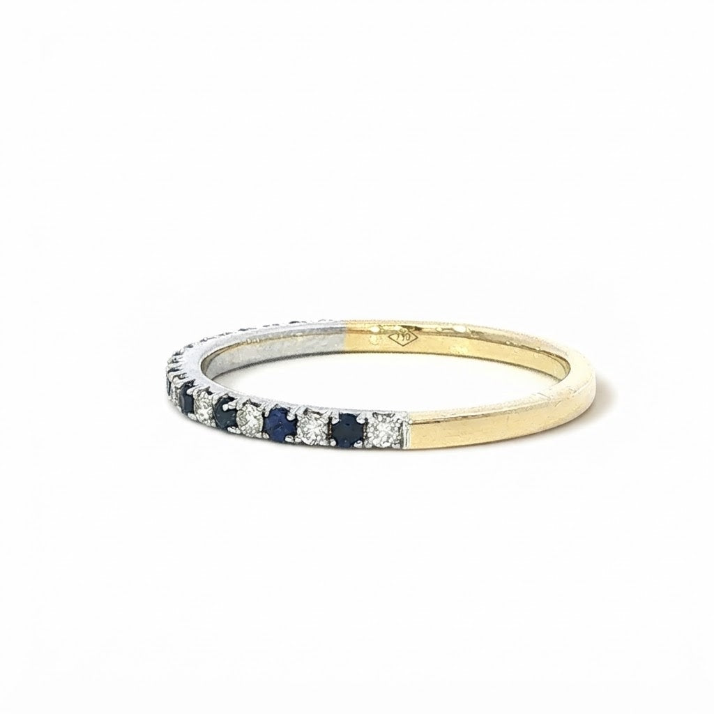 A 18 Carat Yellow and White Gold Sapphire and Diamond Half Eternity Style Ring