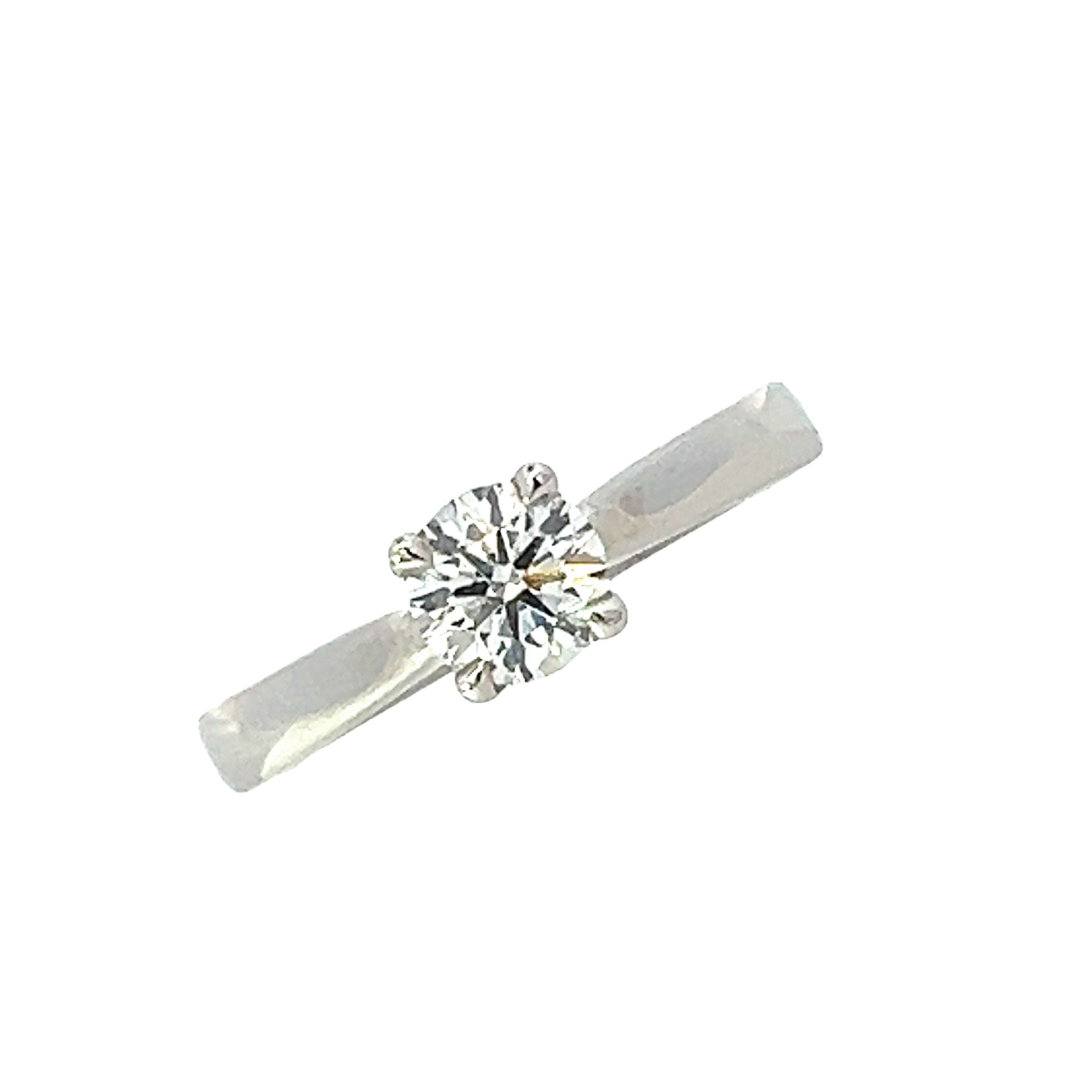 A Platinum and Diamond Engagement Ring - 0.60 E VVS2