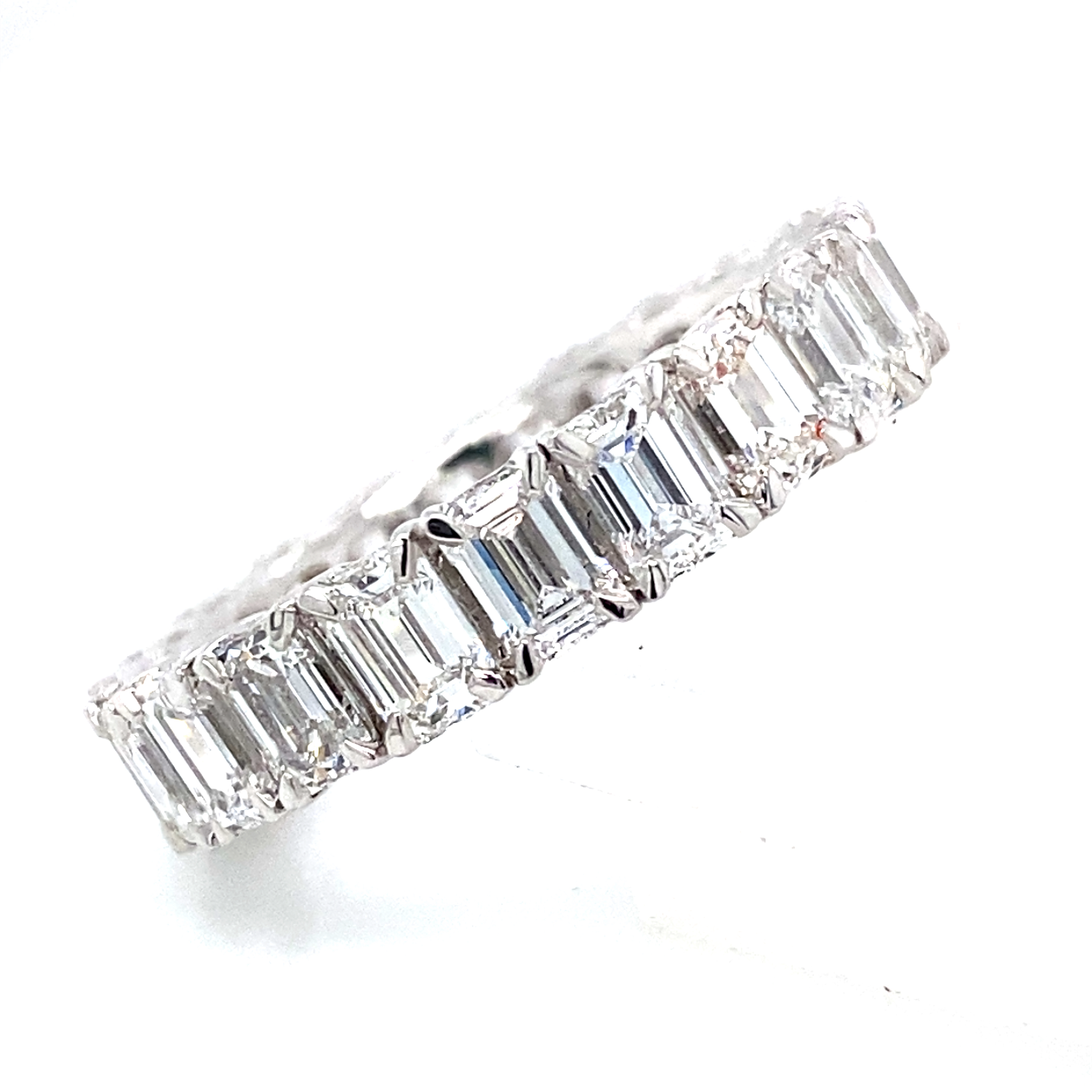 A Platinum and Emerald Cut Diamond Full Eternity Ring - 5.11 Car