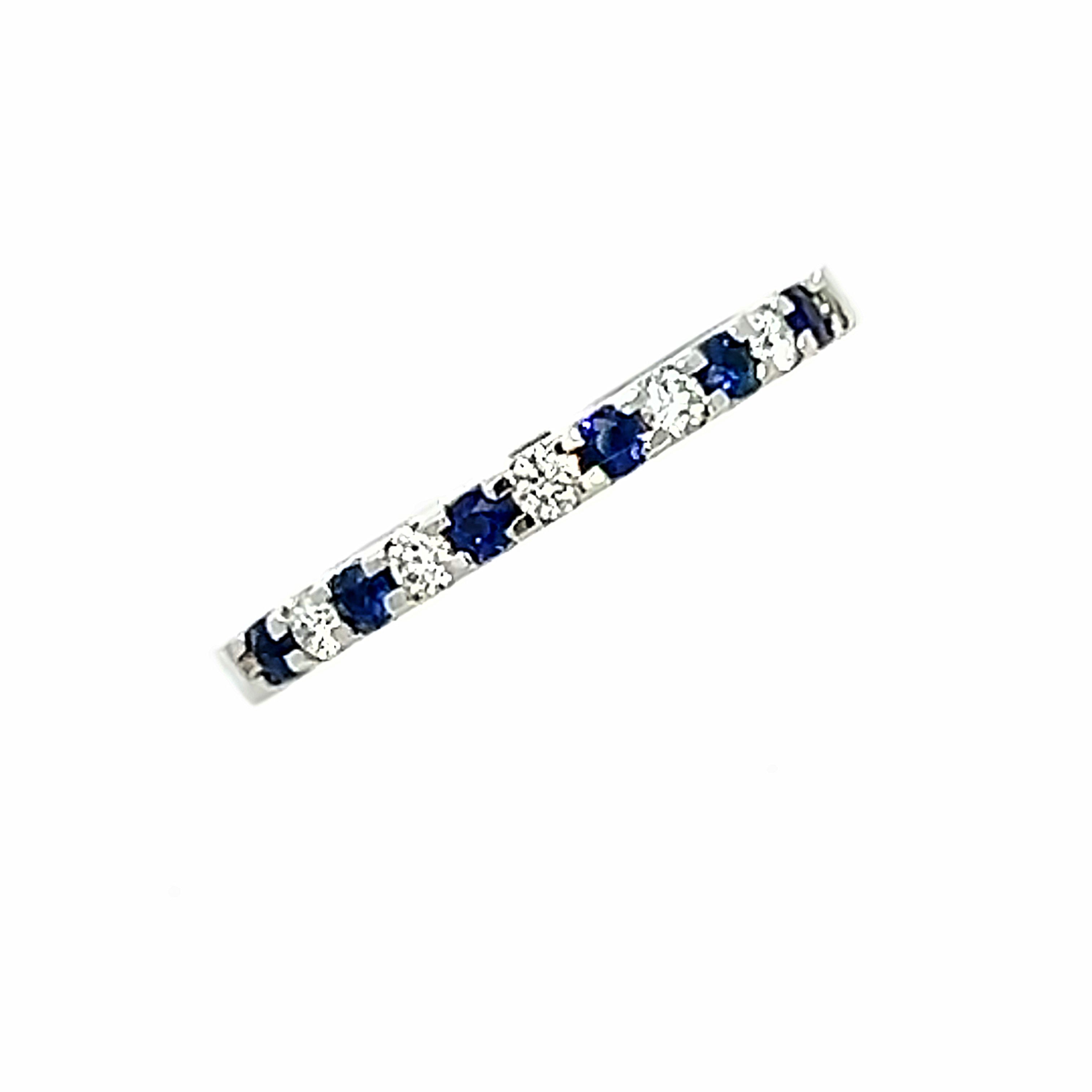 A Platinum Sapphire  and Diamond Cog Set ½ Eternity Ring