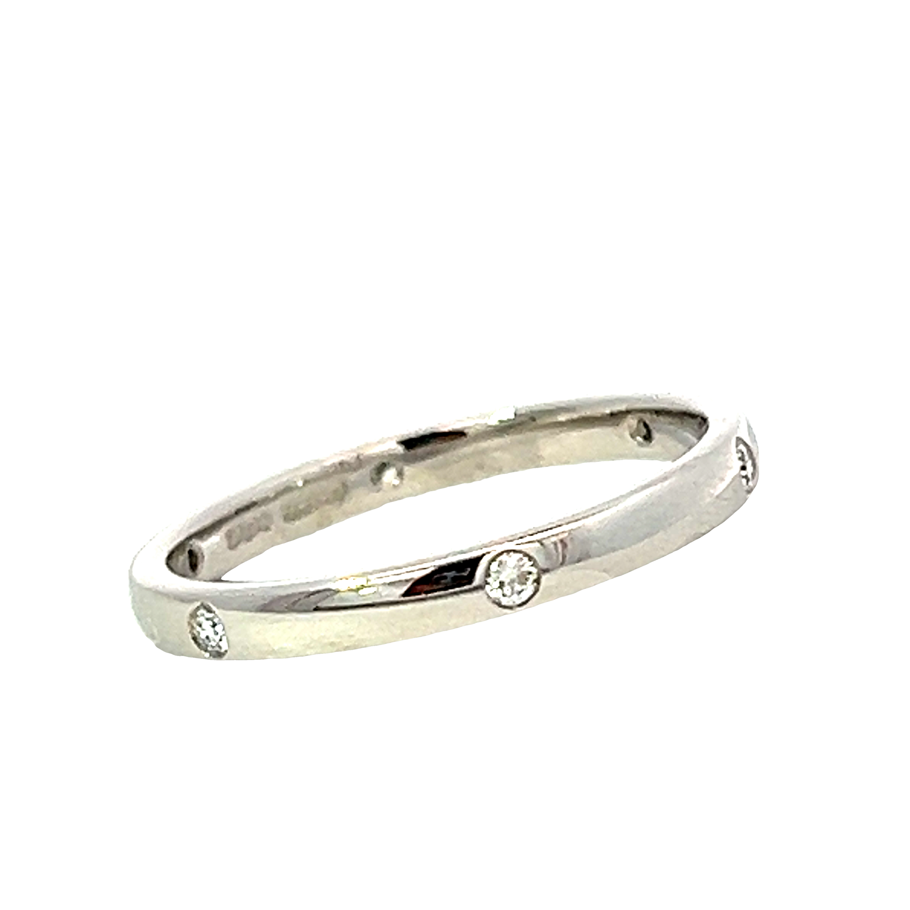 A Platinum and Diamond Flush Set Eternity Style Band