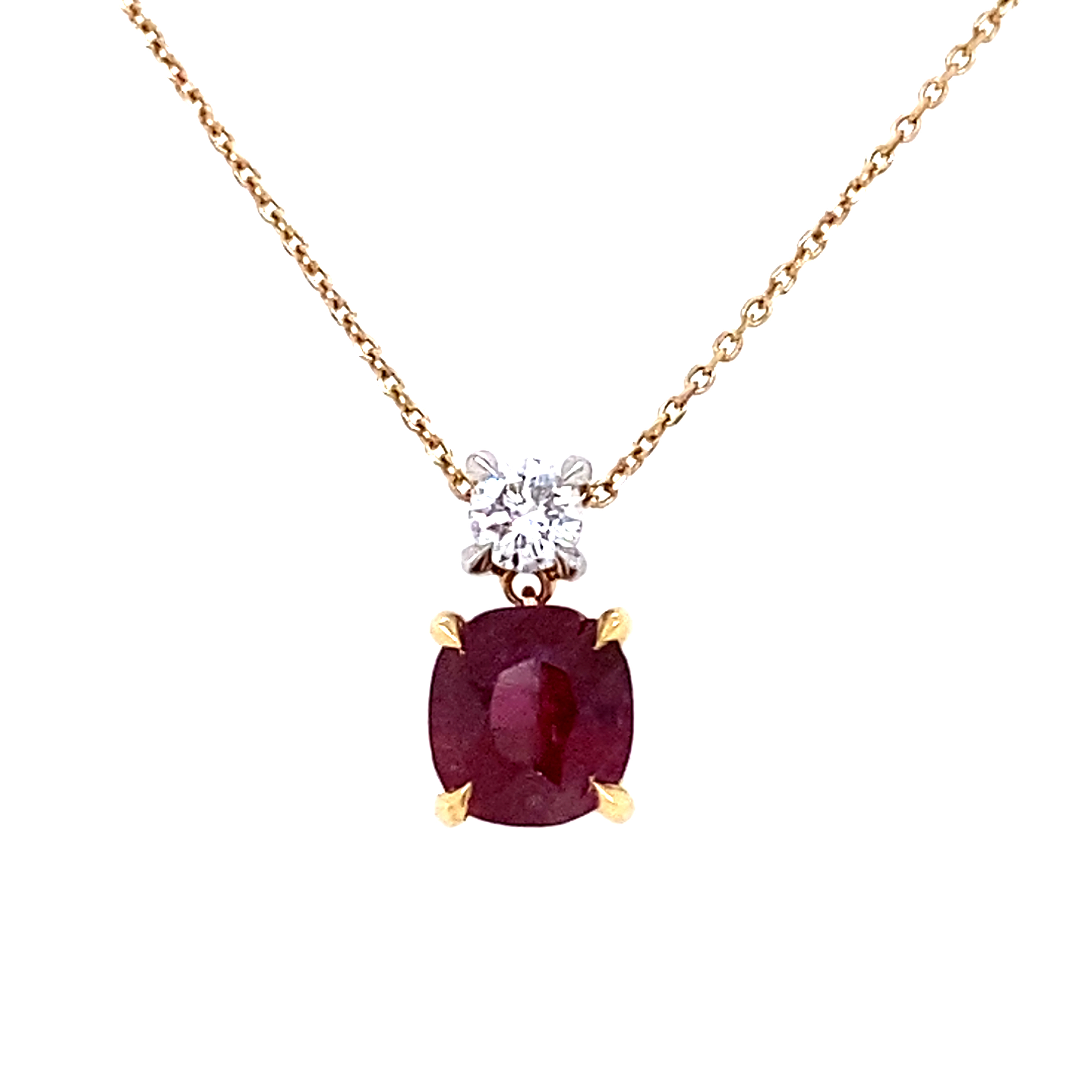 A Cushion Shaped Ruby Pendant with A Diamond Accent Bail
