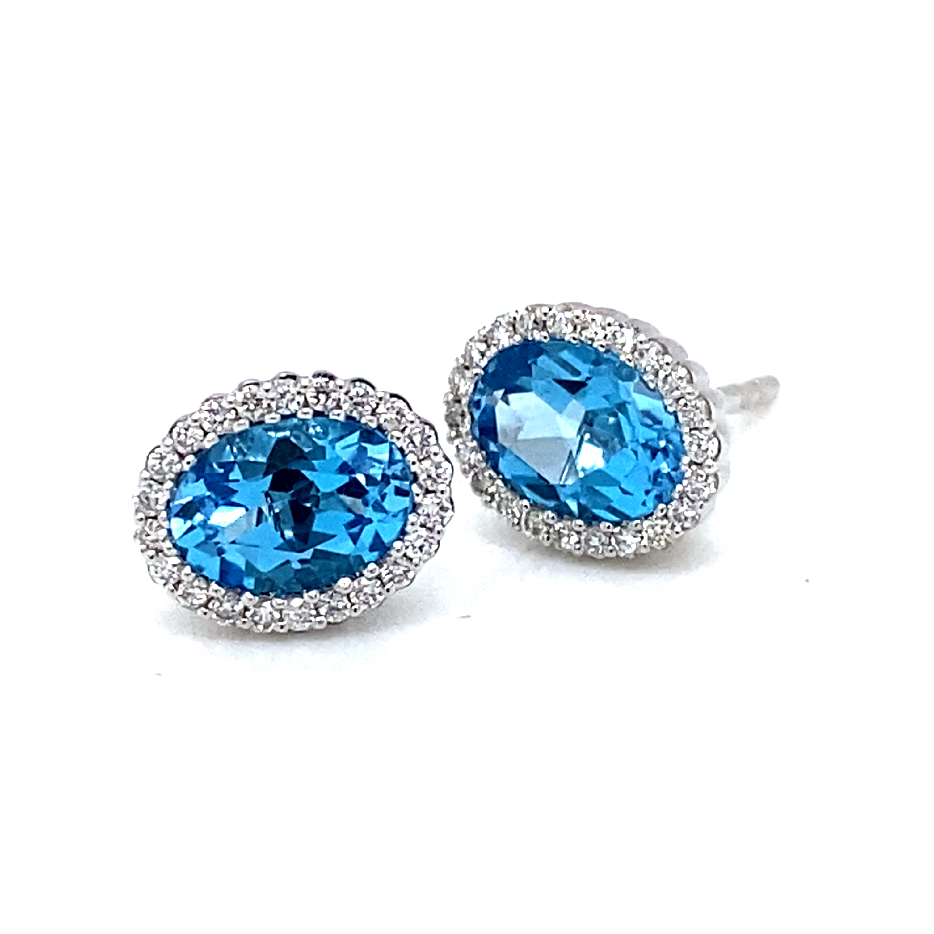 Blue Topaz and Diamond Oval Studs in 18 Carat White Gold