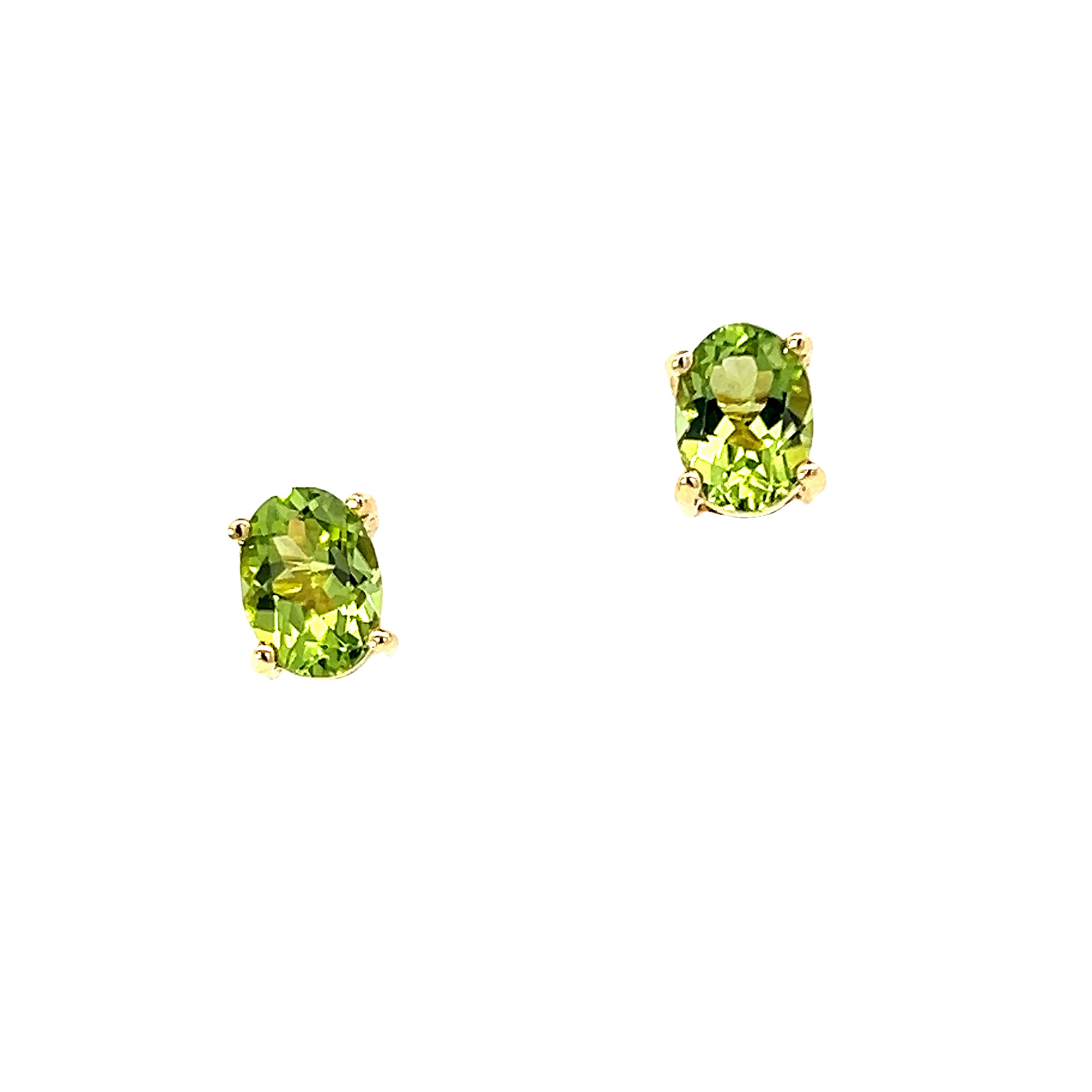 A Pair of 18 Carat Yellow Gold Oval Peridot Studs
