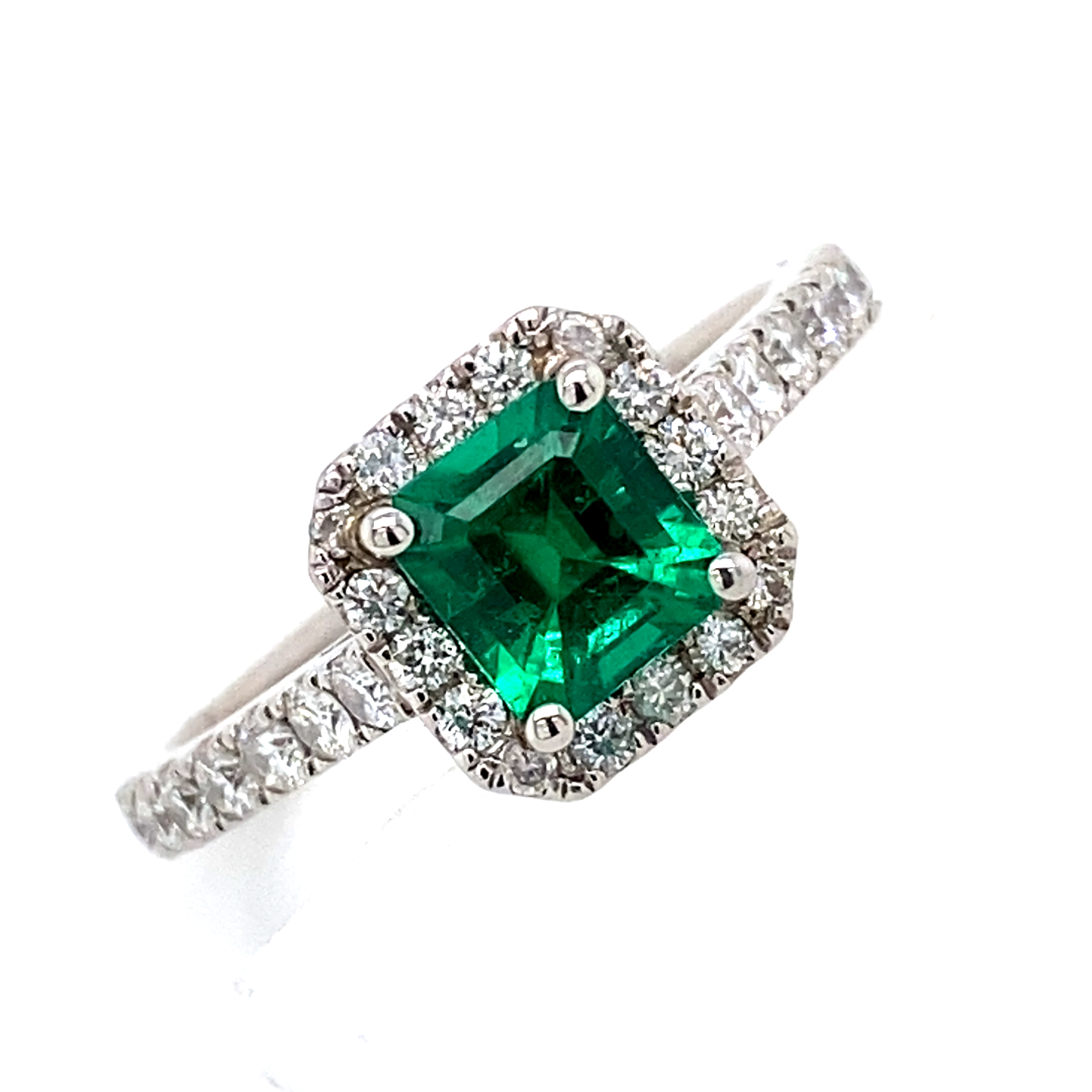 Platinum and Gold 0.58ct Emerald and 0.46ct Diamond Ring
