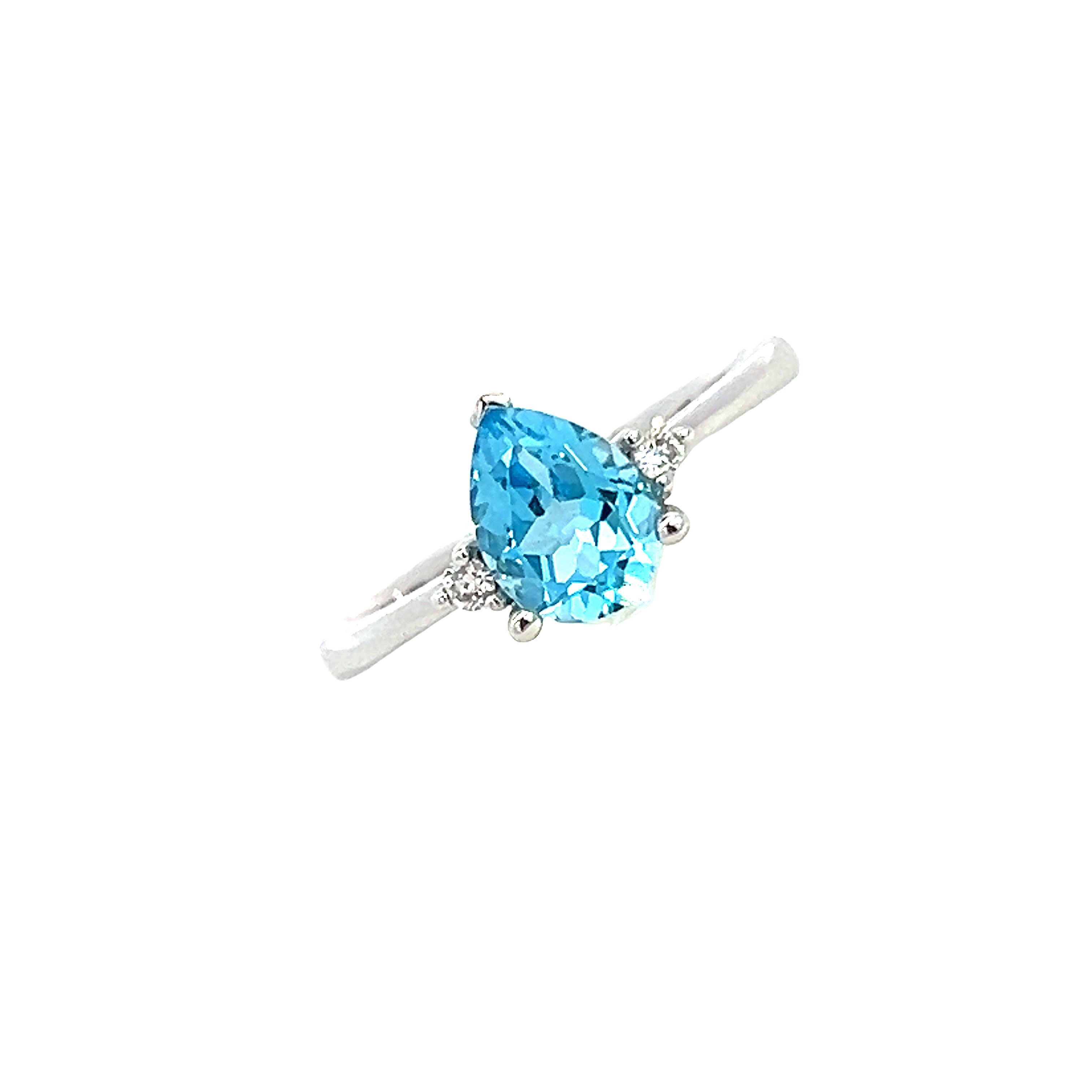 Blue Topaz and Diamond Ring in 18 carat white Gold