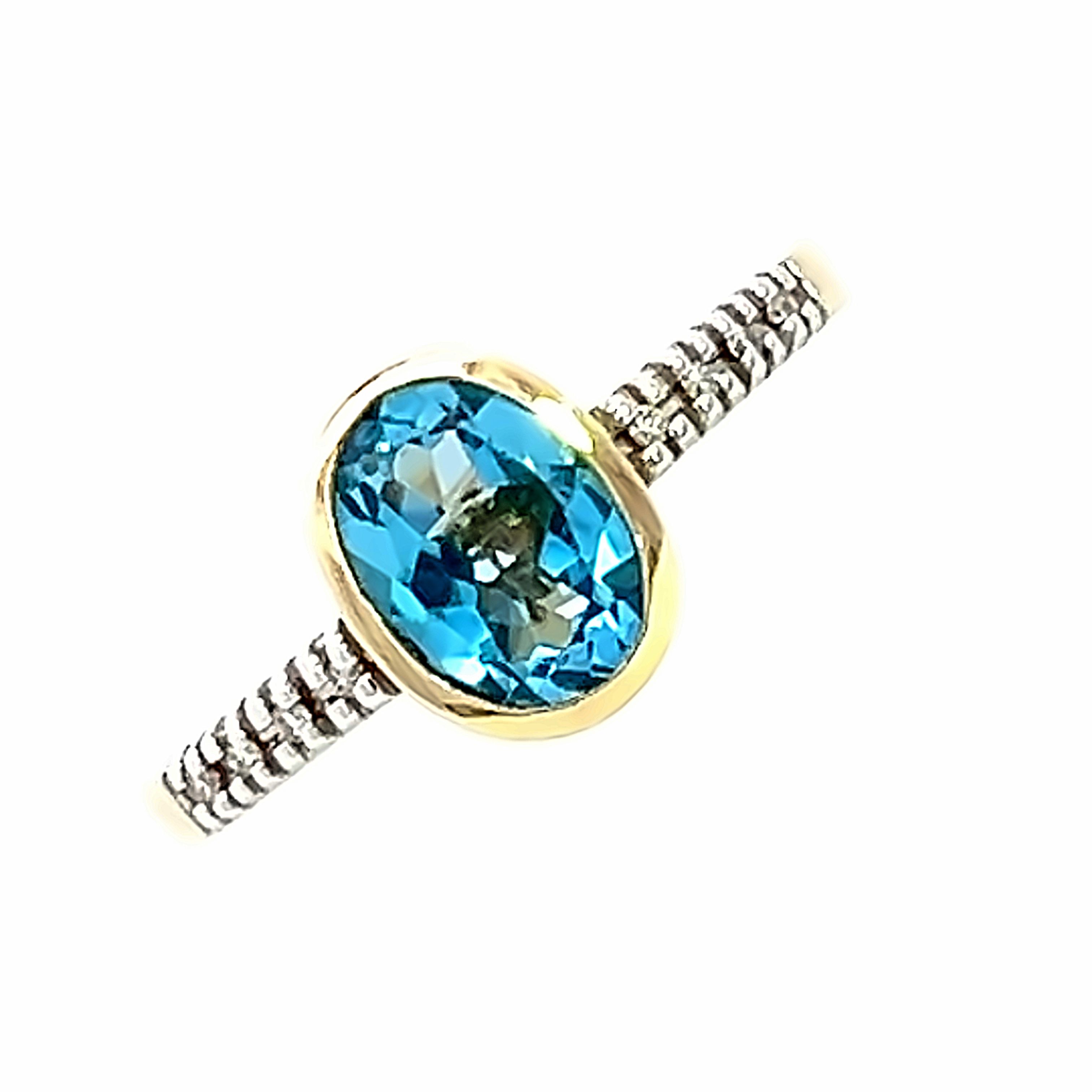 9 Carat Yellow and White Gold Blue Topaz and Diamond Ring