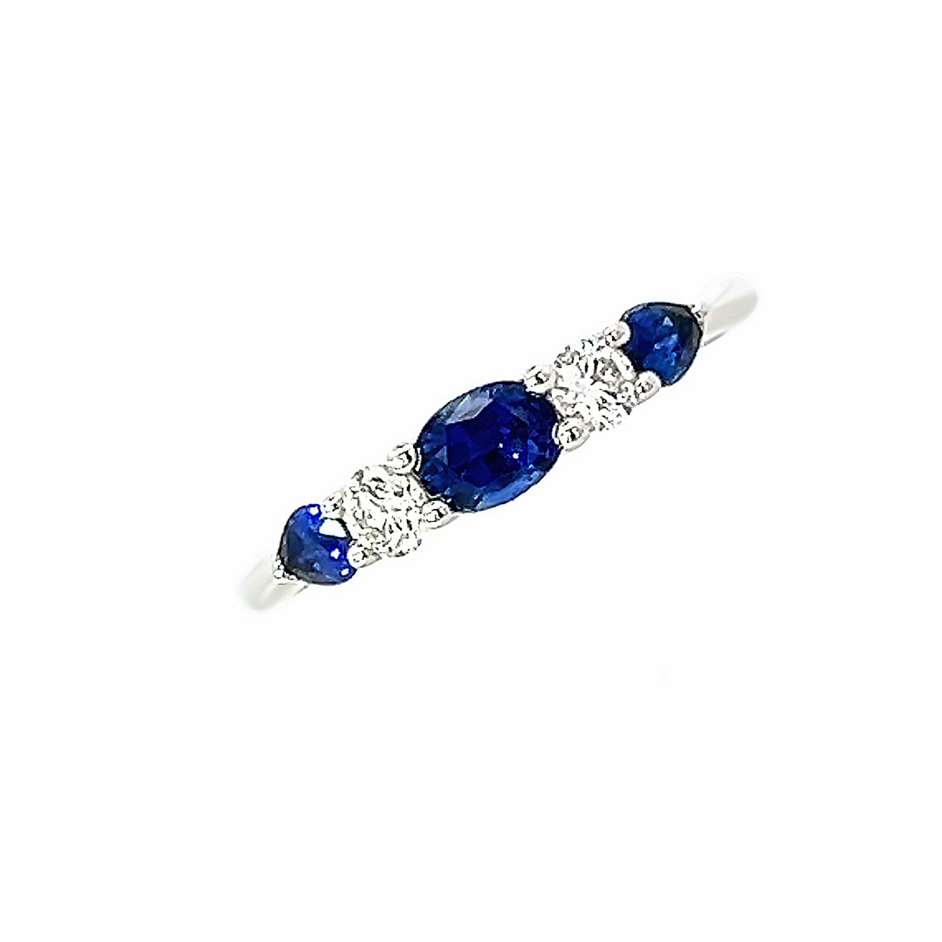 An 18 Carat White Gold five stone Diamond and Sapphire Ring