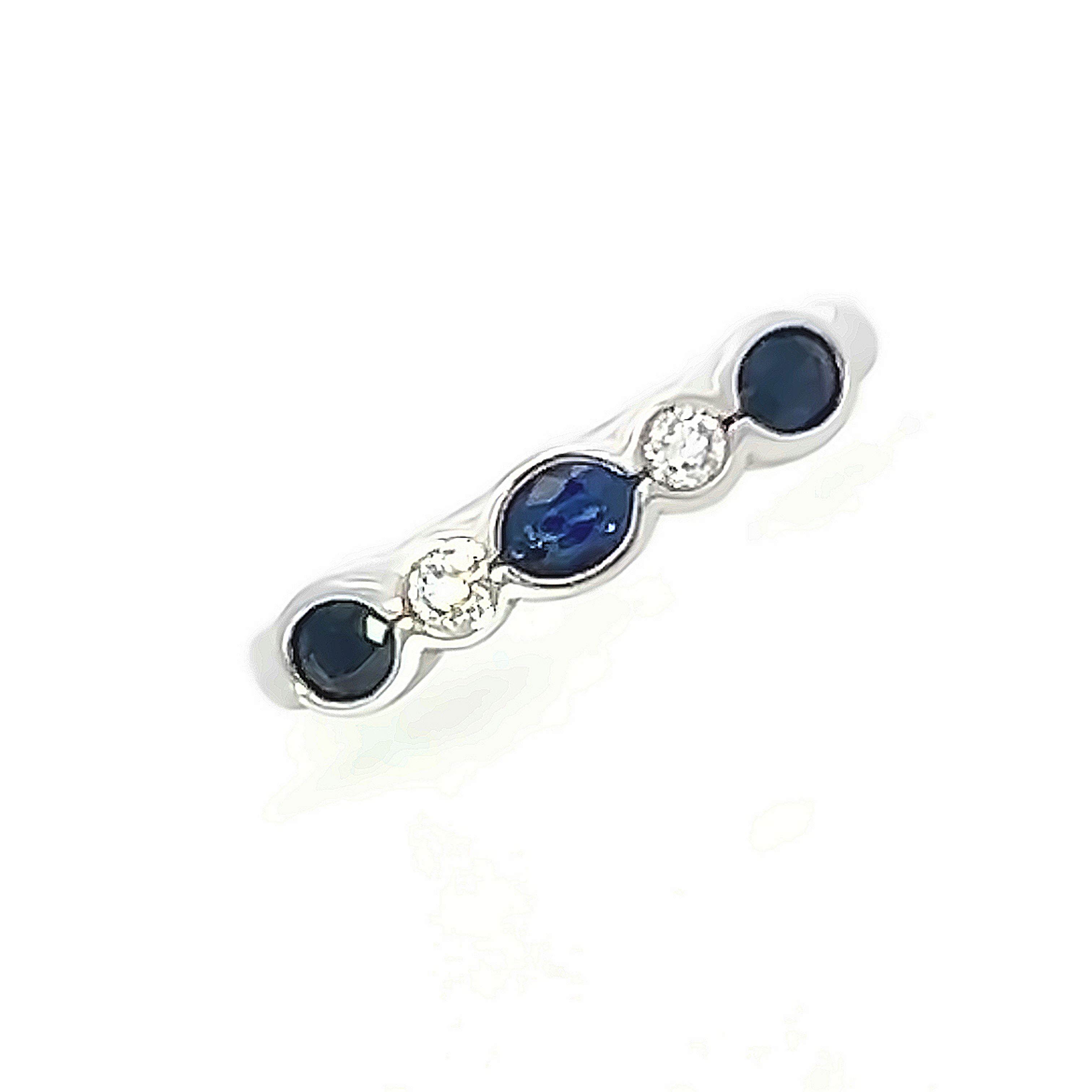 Rub Over Set Oval Sapphire and Diamond Â½ Eternity Ring