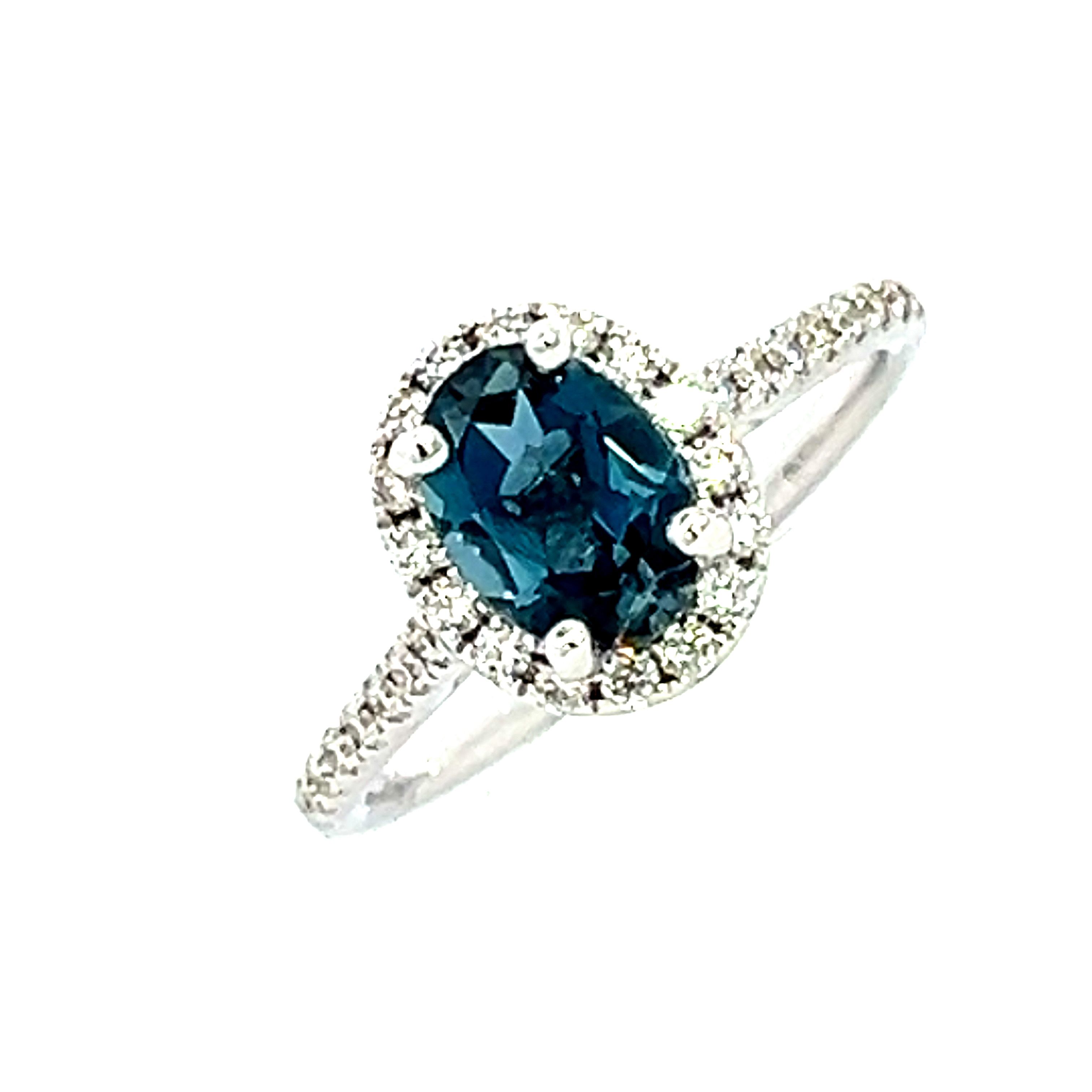 18 Carat White Gold Blue Topaz abd Diamond Ring