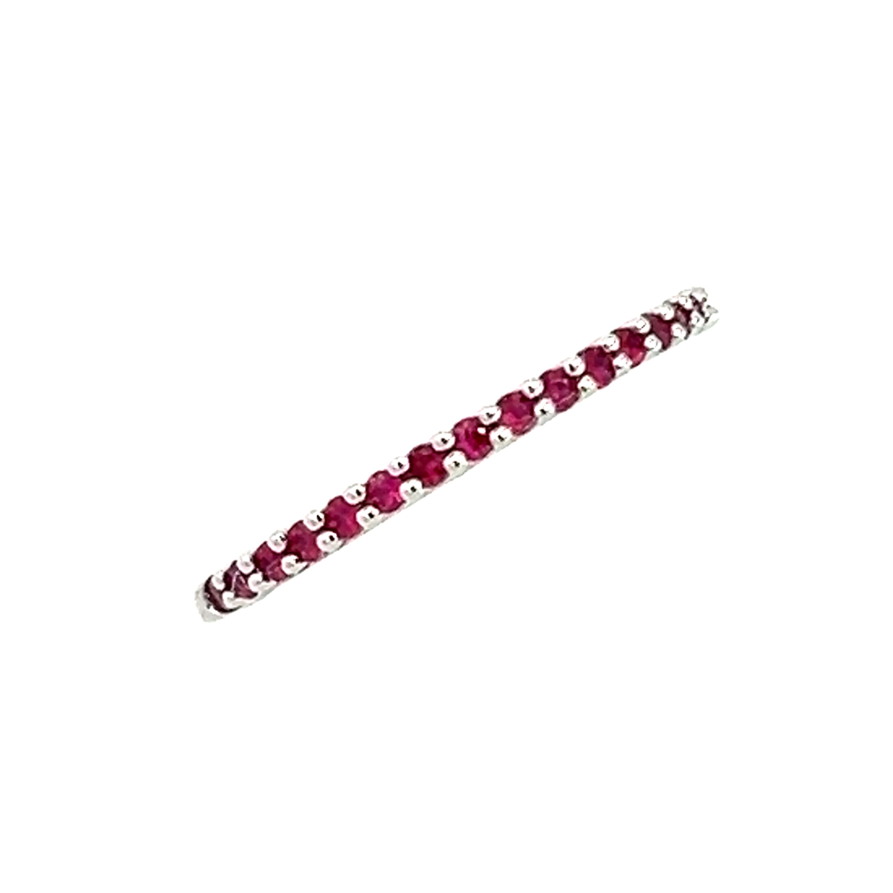 'Wave' Claw set Â½ Eternity style ring with Rubies  in 9ct White