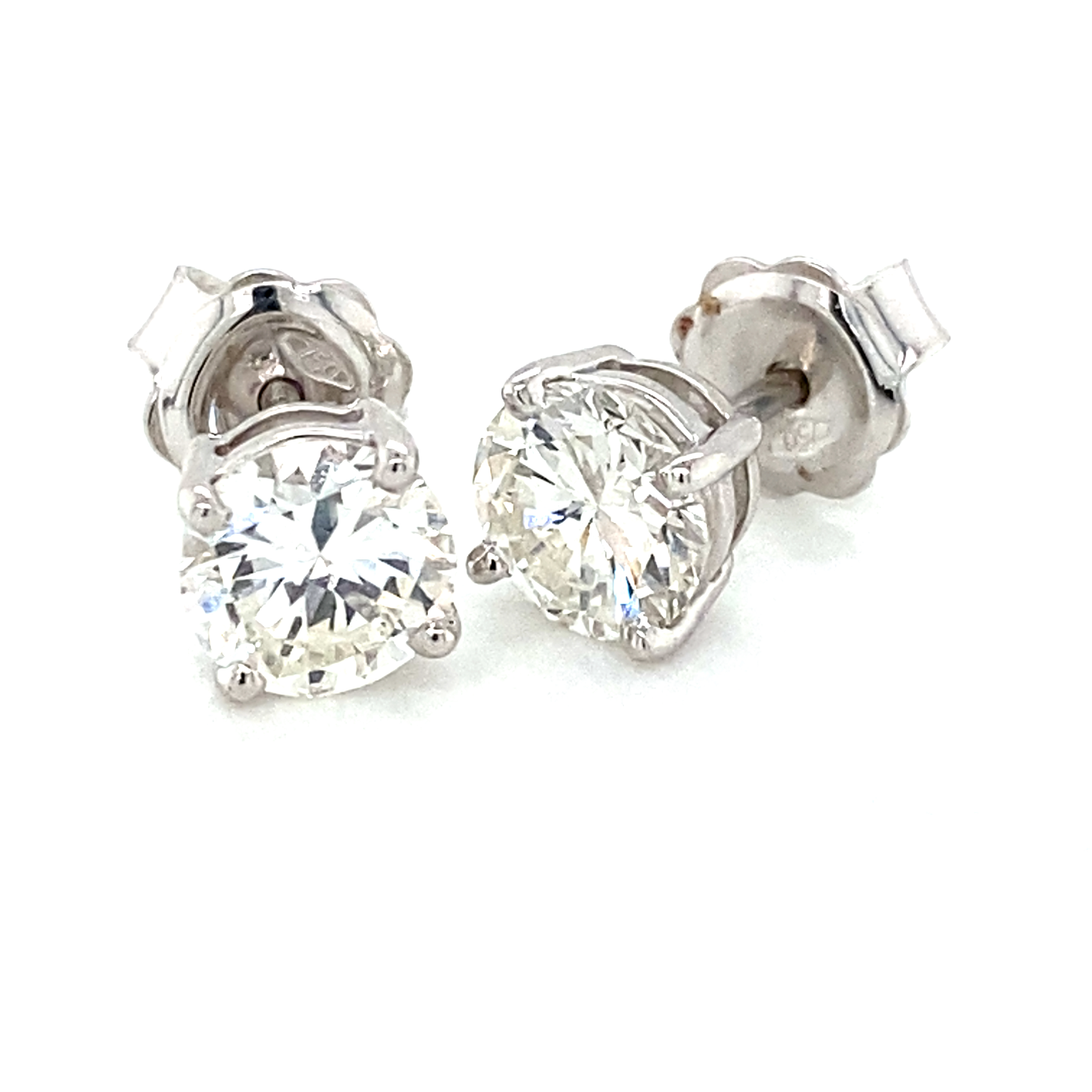 A Stunning Pair of Single Stone Diamond Studs 2.11 Carats