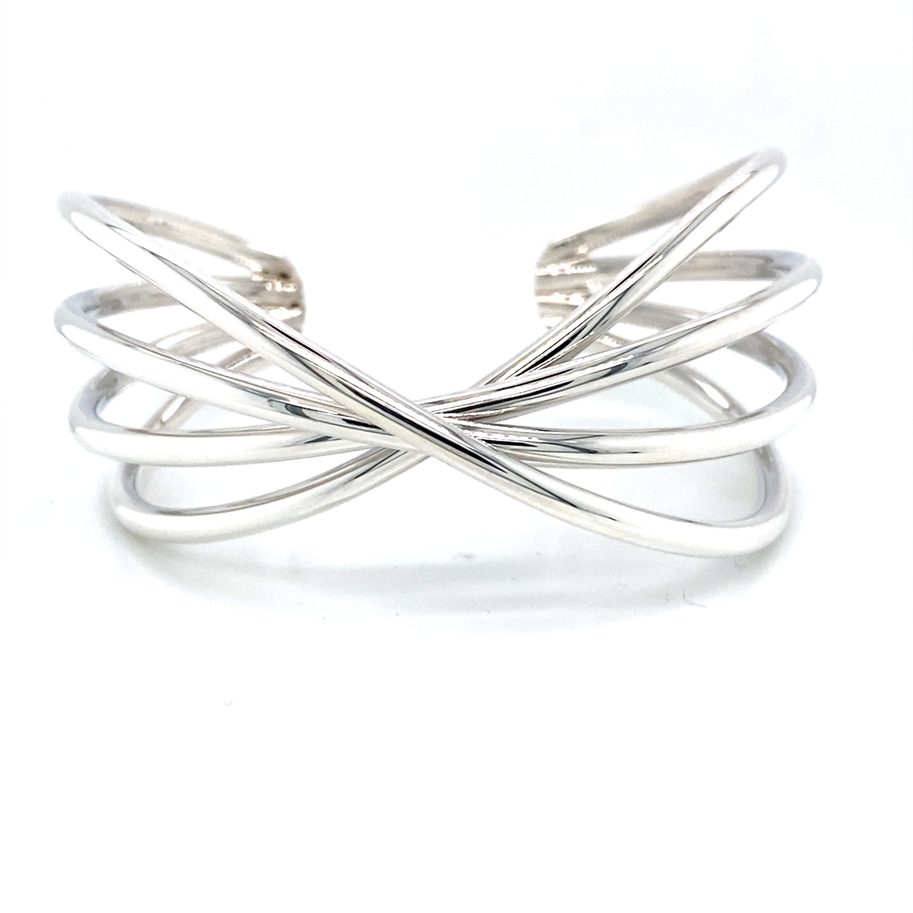 Sterling Silver Bangle with Four Cross Over Wires.