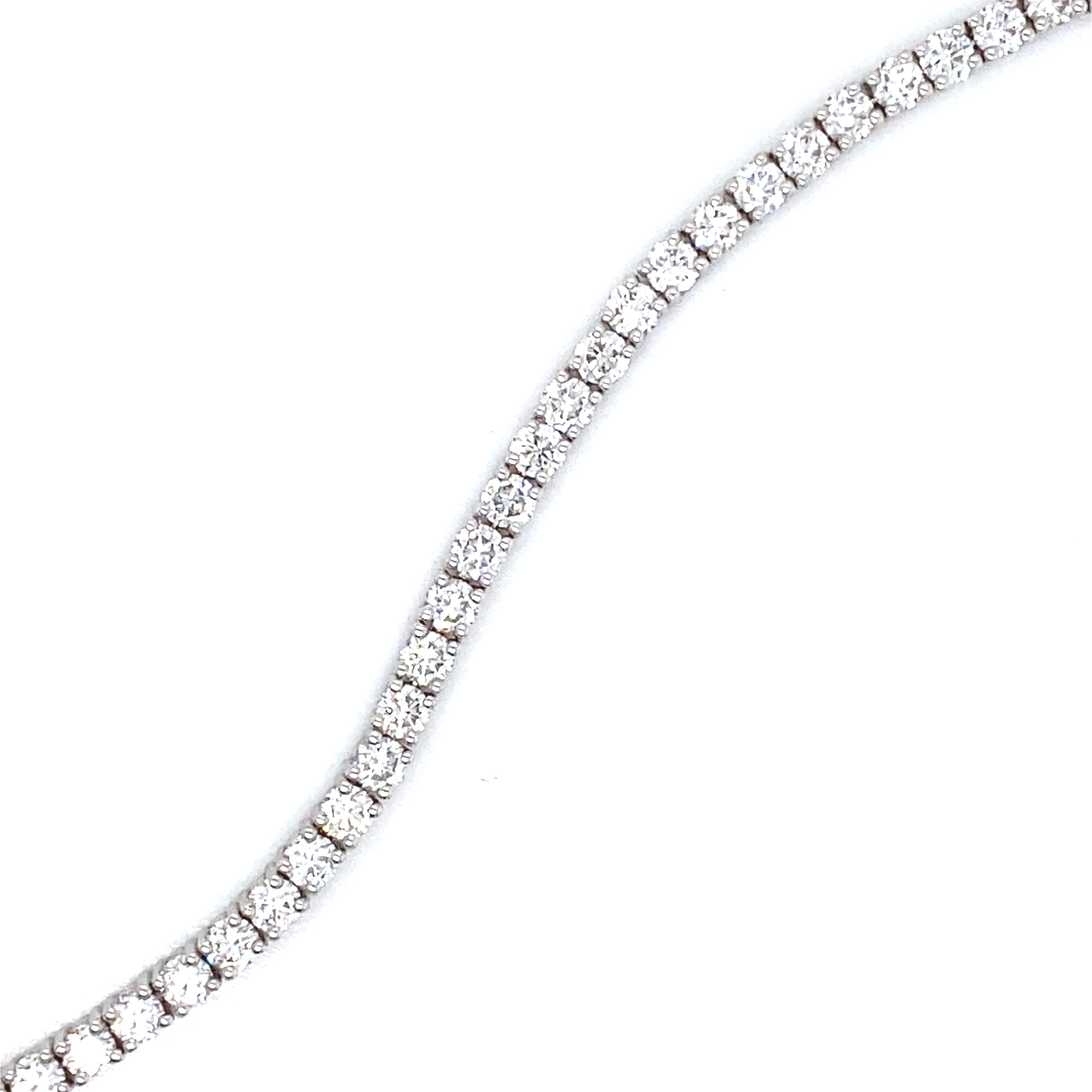 A Platinum and Diamond Line Bracelet - 4.11 carats F/G Vs