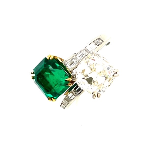 A contemporary Colombian Emerald and Diamond ring