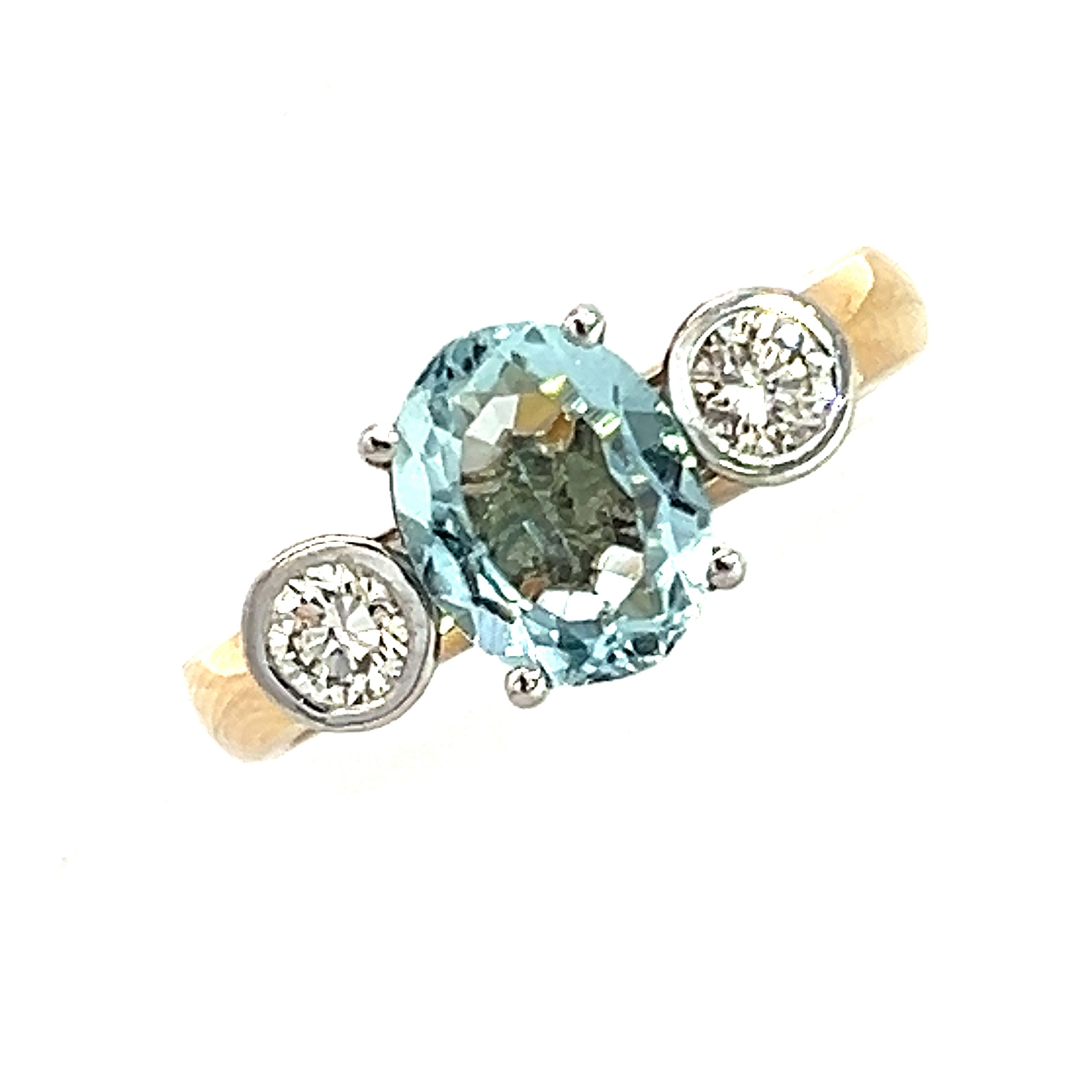 A Modern Aquamarine and Diamond Ring