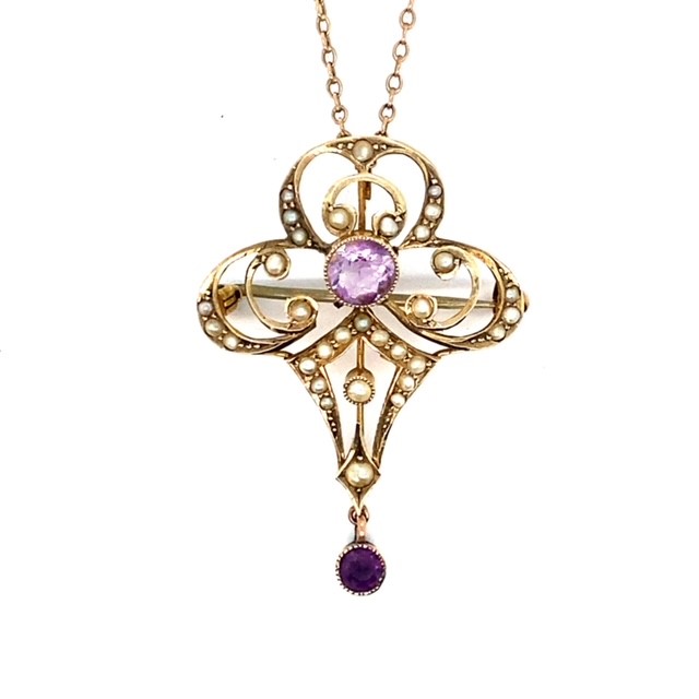 A Victorian pendant featuring amethyst and pearls